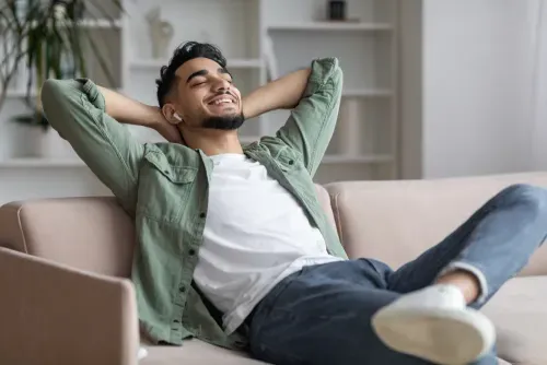 Guy relaxing on a couch